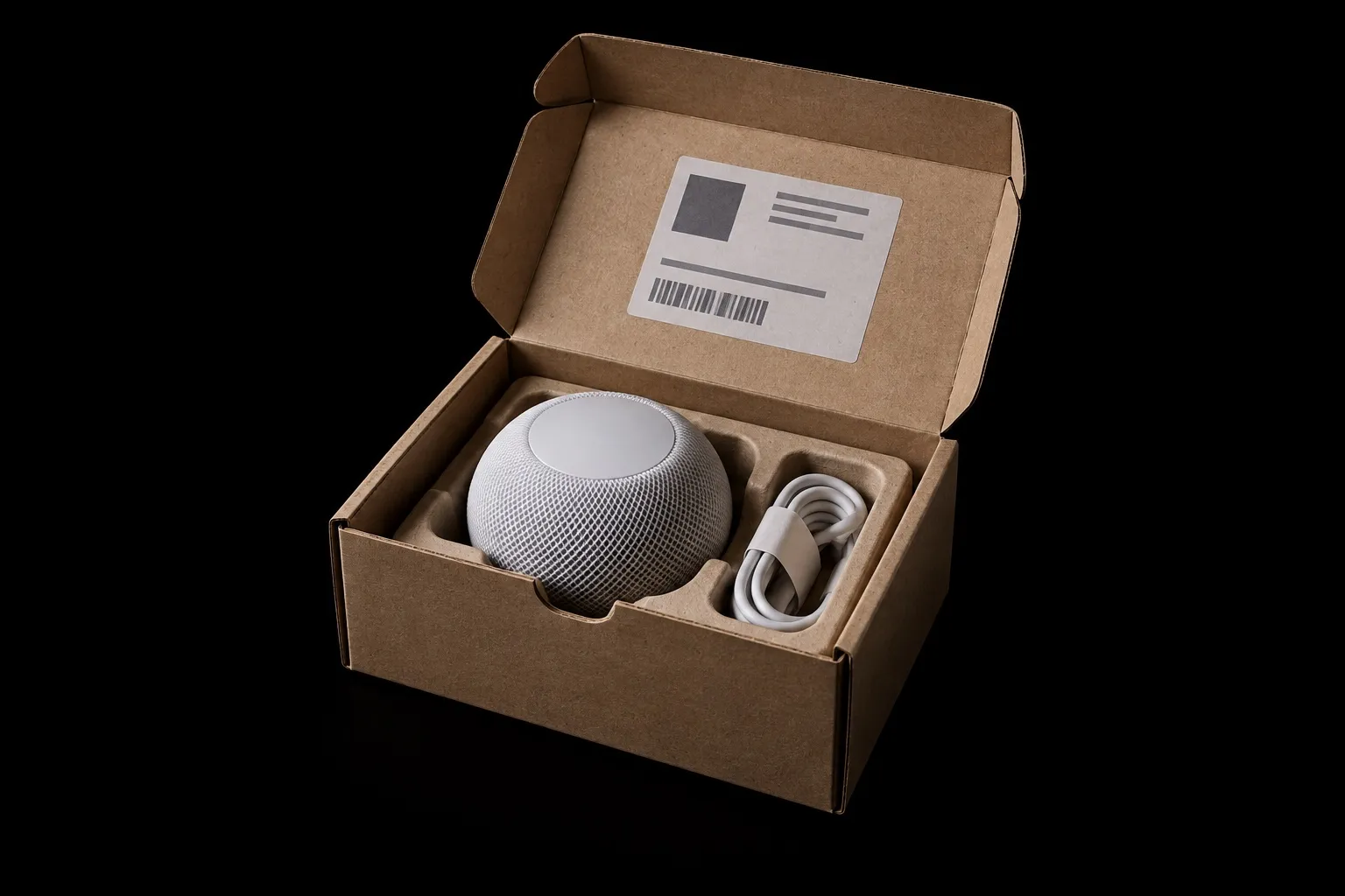 An opened return parcel holding a smart speaker and its cable